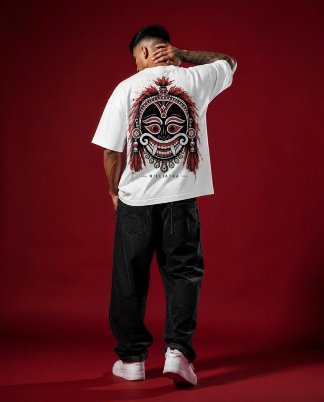 Model wearing the JHUMELO Hilljatra oversized t-shirt