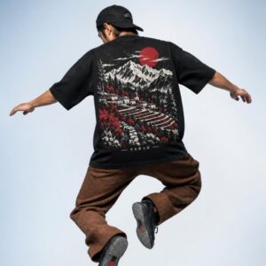 Male model in the JHUMELO Pahad oversized t-shirt, back print